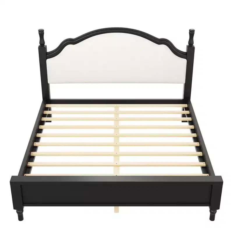 Lit plateforme en bois avec tête de lit capitonnée